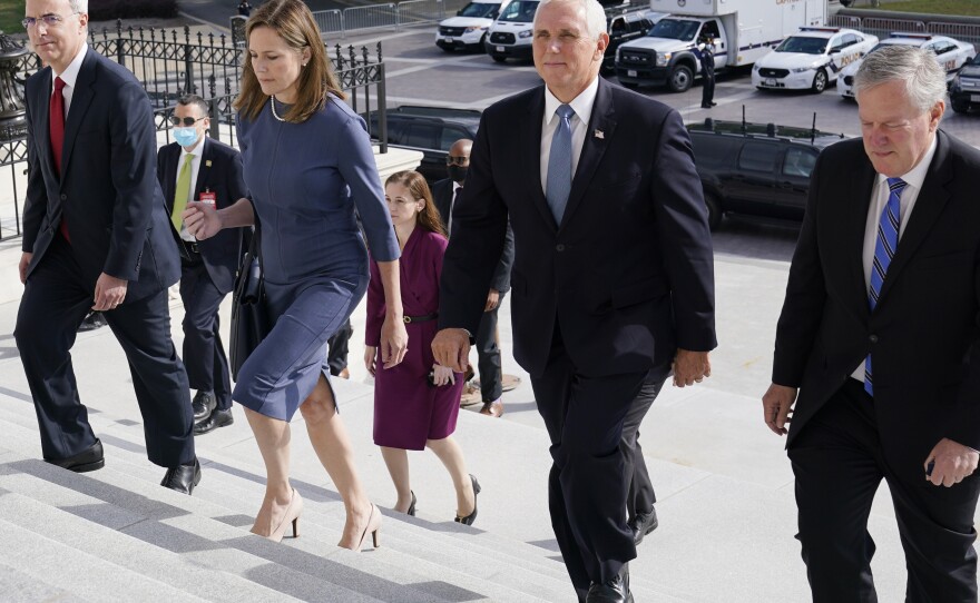 Pat Cipollone, far left, played a central role in the nomination process for Justice Amy Coney Barrett to the Supreme Court.
