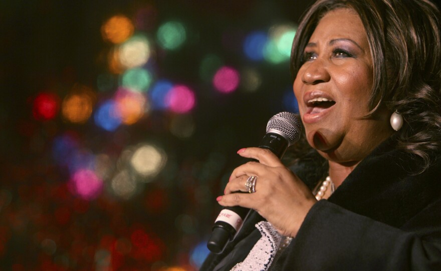 In this Dec. 4, 2008 file photo, Aretha Franklin performs during the 85th annual Christmas tree lighting at the New York Stock Exchange in New York.