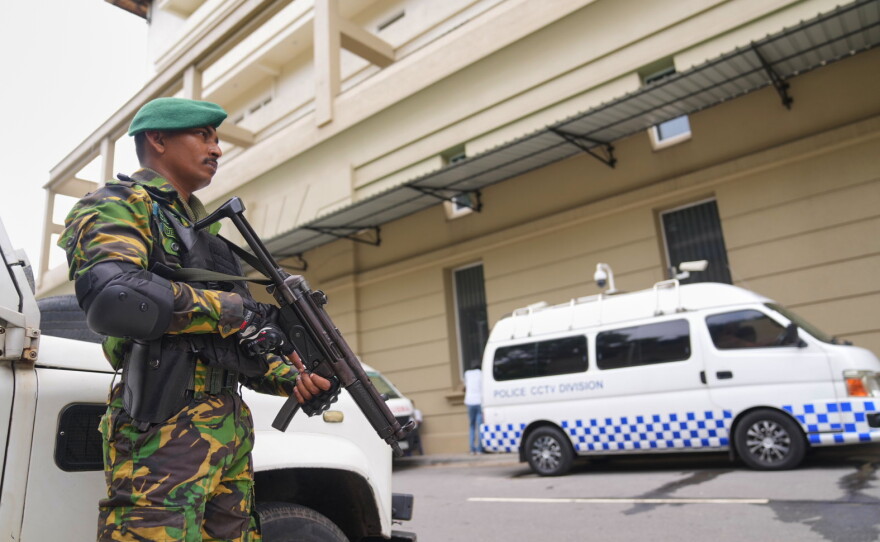 A police commando stands guard at the High Court complex ahead of a verdict related to the 2019 Easter bombings in Colombo, Sri Lanka, Tuesday, Sept. 22, 2026.