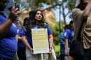 Students rally in support of undocumented students, urging University of California leaders to remove hiring restrictions for them, in front of Kerckhoff Hall at UCLA in Los Angeles on May 17, 2023.