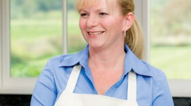 Cook Bridget Lancaster in the kitchen ready to show host Christopher Kimball how to make a Texas favorite — shredded barbecued beef.