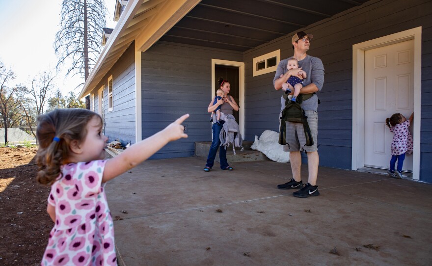 Noah and Chelsea take their kids to look at the new house they're rebuilding in Paradise.