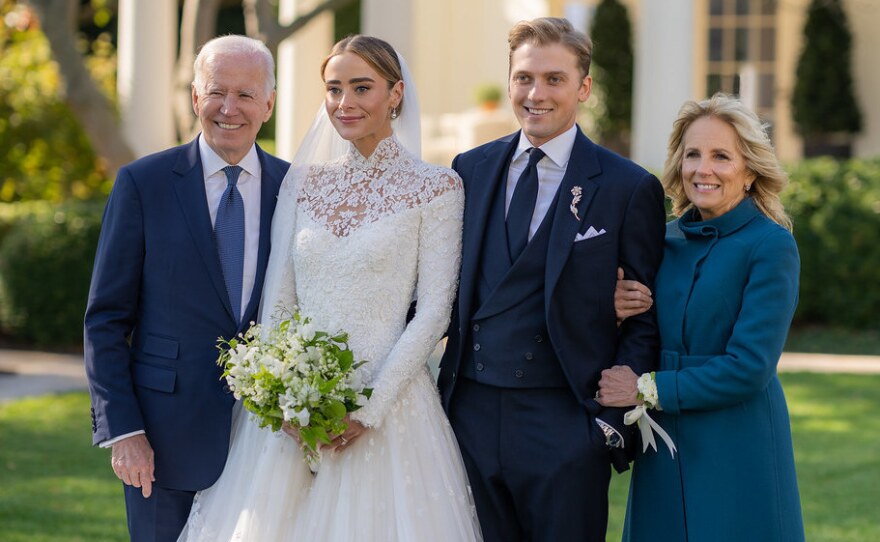 President Biden and first lady Jill Biden pose with their granddaughter Naomi Biden and her husband Peter Neal in this White House official photo.