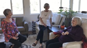 One-hundred-year-old Ginny Davenport enjoys a chat with her daughters Kelly Davenport (center) and Riley Davenport (left), Feb. 11, 2019.