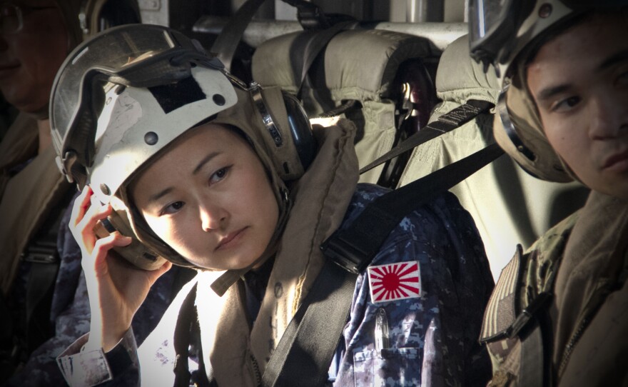 A Japanese officer for the Japanese Maritime Self Defense Force prepares for the flight to JS Kaga on Nov. 6, 2024.