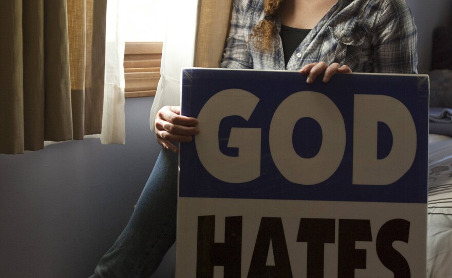 Megan Phelps-Roper, granddaughter of Westboro Baptist Church leader Fred Phelps, is seen during her days with the church. Now alienated from their family, Phelps-Roper and her sister, Grace, speak to religious and cultural groups.