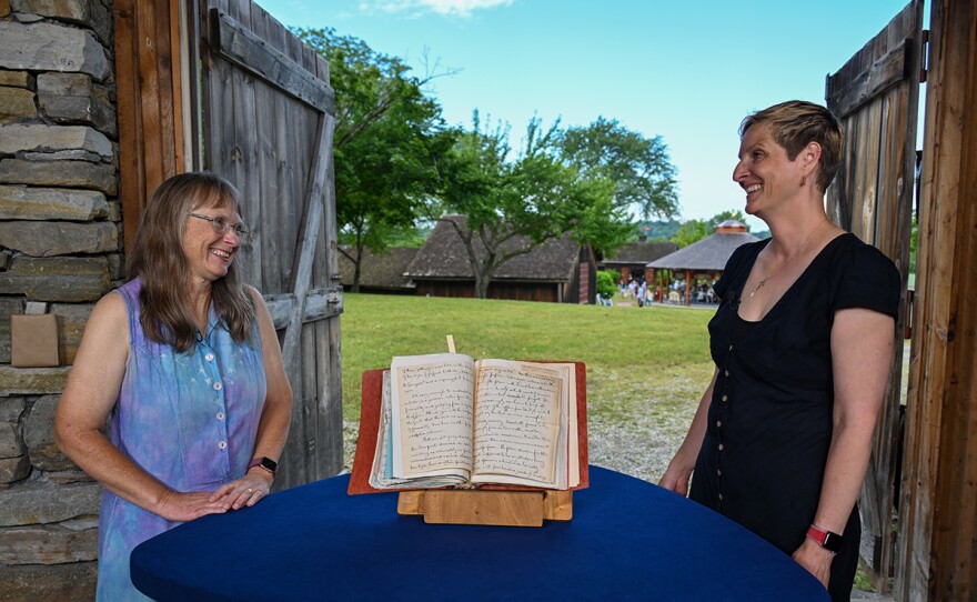Devon Eastland (right) appraises 1901 - 1904 N.C. Wyeth letters, in Shelburne, Vt.