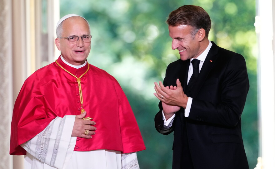Pope Leo XIV, left, and French President Emmanuel Macron, attend a joint statement at the Elysee Palace, Friday, Sept. 25, 2026.