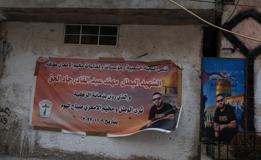 A sign in the Al-Amari camp in Ramallah commemorates victims of a Nov. 9 raid on the camp.