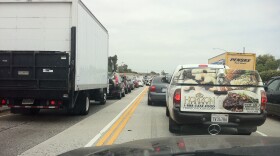 Sharing a ride can help reduce freeway congestion in San Diego.