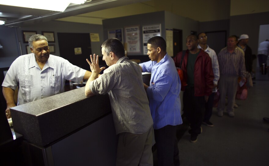 Elroy Thomas has managed the Huntsville Greyhound station for 24 years. "When I first came to work here they called them convicts...Now they're called clients. I tell 'em, you're not a client of mine."