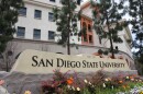 Sign in front of San Diego State University building that reads "San Diego State University."