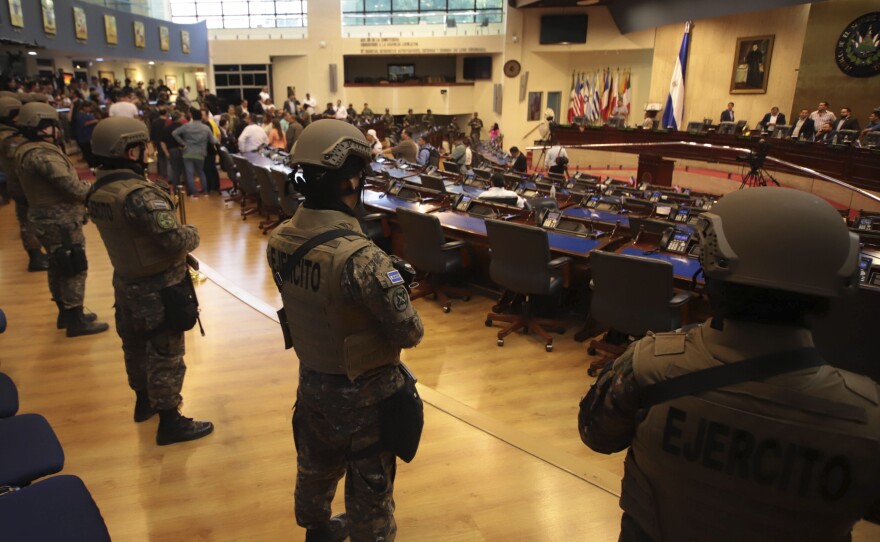 Armed Special Forces soldiers of the Salvadoran Army, following orders of President Nayib Bukele, enter El Salvador's congress during a vote on a security bill on Feb. 9.