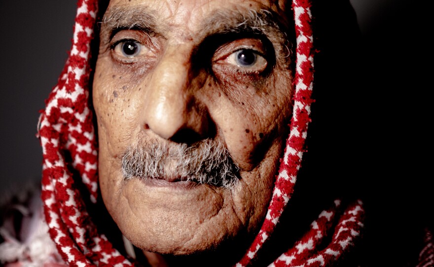 84-year-old Mohammed Suleiman Khader lived through what Palestinians call the Nakba — the catastrophe — of 1948. That year, his family fled their village near what is now Tel Aviv, and came to Al-Am'ari refugee camp in Ramallah, where they've lived ever since. "We should have stayed. We shouldn't have left," he says.