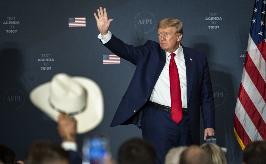 Former President Donald Trump acknowledges the crowd after speaking during the America First Agenda Summit on July 26 in Washington, D.C.