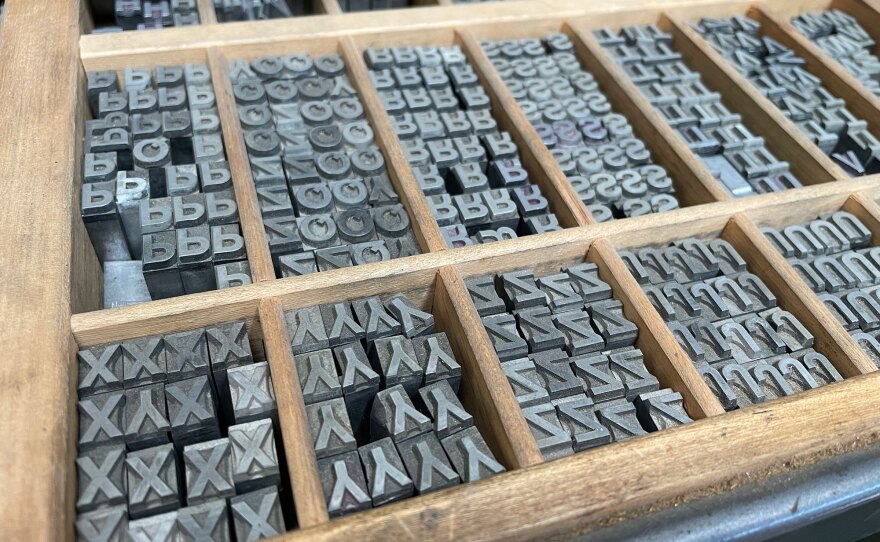 A printing press font drawer containing individual capital letters is pictured at the Athenaeum Art Center's Print Studio in Logan Heights on Dec. 19, 2022.