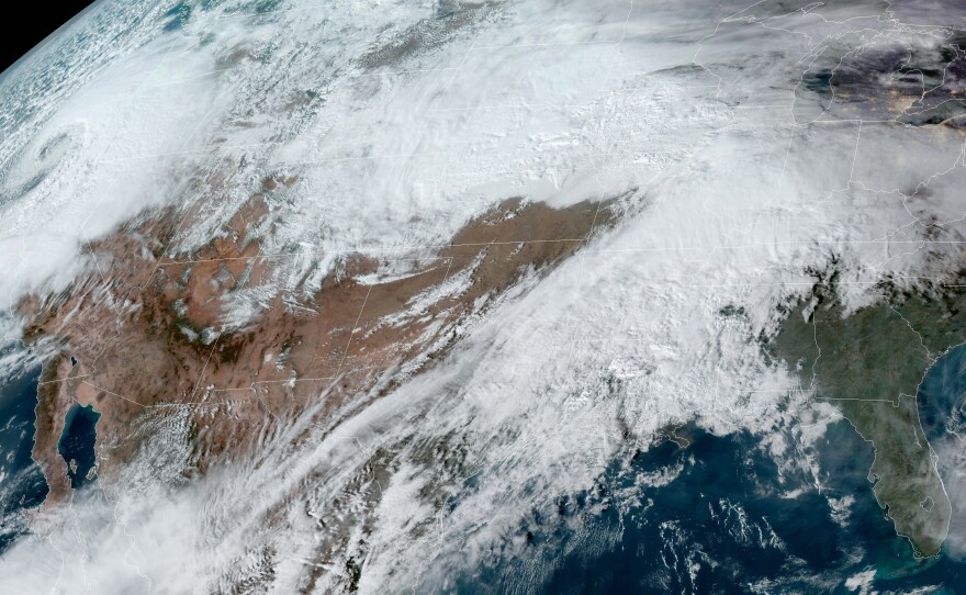 "Two back to back powerful storms will produce widespread heavy snow" in parts of the western and central U.S., the National Weather Service says.