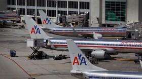 American Airlines planes sit on the tarmac at Miami International Airport on October 4, 2011 in Miami, Florida. 