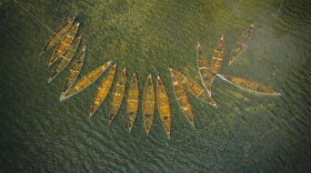 Camp Widjiwagan submerged some of their canoes in lake waters to protect them from the wildfires.