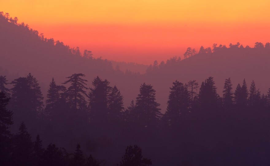 The San Gabriel Mountains National Monument sits on more than 300,000 acres of Angeles National Forest, an area often at risk of wildfire — as in 2009, when smoke settled the forest in an orange haze.