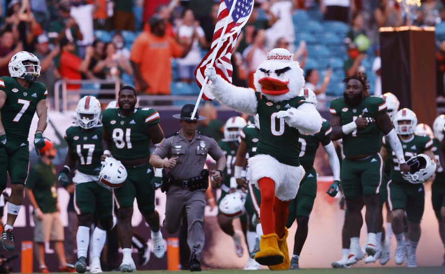 In the absence of a photo of the cat itself, please accept this photo of the Miami mascot leading the team onto the field before the game against Appalachian State.