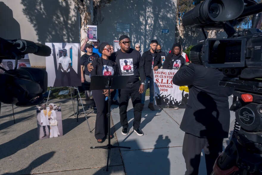 Abdul Kamara's mother and stepfather, Fredrika Nabbie and Gibrilla Turay, are seen at a press conference on Dec. 9, 2024 in front of the Vista Detention Facility in Vista, Calif.
