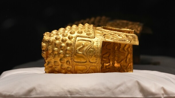 Dacian gold items, a 2,500-year-old helmet and wristbands, stolen from a museum in the Netherlands and then recovered by Dutch authorities, are presented during a press conference after being returned, at the National Museum of Romanian History, in Bucharest, Romania, Tuesday, April 21, 2026.