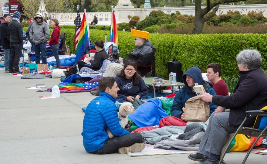 People camp on the sidewalk outside the U.S. Supreme Court Saturday, to attend the Tuesday arguments over gay marriage. The line began forming Friday — four days before the session.