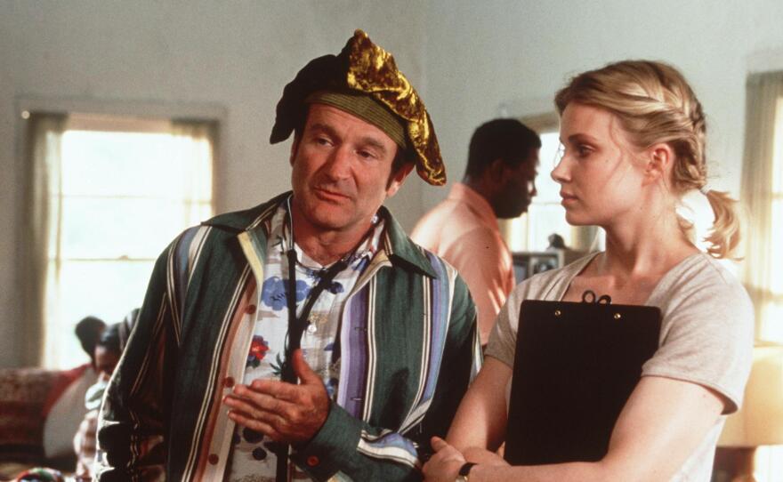 Williams and co-star Monica Potter in the 1999 movie Patch Adams. Although the film was commercially successful, it was one of a number of critics' flops Williams headlined in the late '90s and early 2000s.