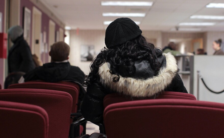 People wait to see a career adviser at a training center operated by the New York Department of Labor in New York City. NPR and the Kaiser Family Foundation conducted a survey on the emotional, physical and financial effects of being without work for a year or more. Nearly 70 percent of respondents would like the government to offer more job training opportunities.