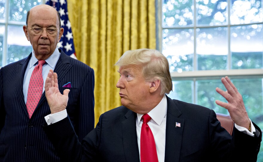 Commerce Secretary Wilbur Ross, with President Trump at the White House in 2018,  approved adding to the 2020 census a question asking, "Is this person a citizen of the United States?"