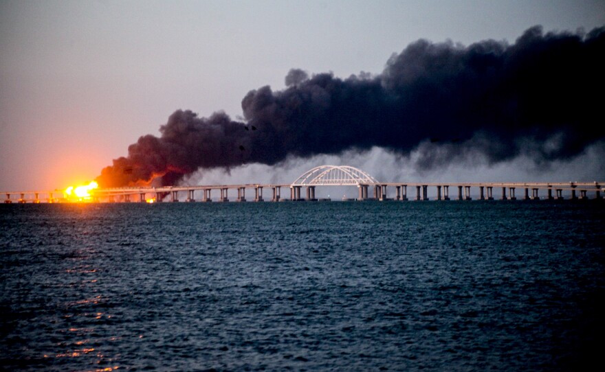 Fire on the Kerch bridge in the Kerch Strait, Crimea, following an explosion on Oct. 8.