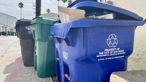 Trash and recycling bins sit curbside in Ocean Beach, Sept. 17, 2025.