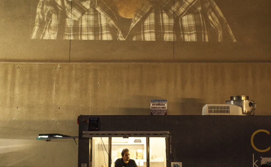 The kosher taco experience compliments a video exhibit by El Paso artist Peter Svarzbein, which is projected against a building downtown.