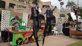 Two San Diego Steampunk Society stilt walkers at a San Diego County Fair media preview event at the Del Mar Fairgrounds, May 17, 2016. 