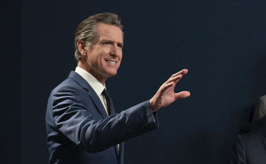 California Gov. Gavin Newsom answers a question concerning three gun control measures he signed during a news conference in Sacramento, Calif., Sept. 26, 2023. An alternative mental health court program designed to fast-track people with untreated schizophrenia into housing and medical care starts in San Francisco and six other California counties. 