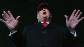 President Donald Trump speaks with reporters at Joint Base Andrews, Md., Sunday, April 12, 2026, after he returned from Miami.