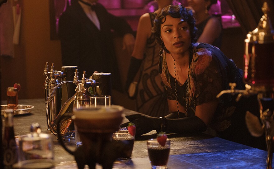 Chantel Riley as Trudy in a scene from  "Healing Hands." Protecting a faith-healer unexpectedly takes the ladies into Toronto's fledgling jazz scene. 