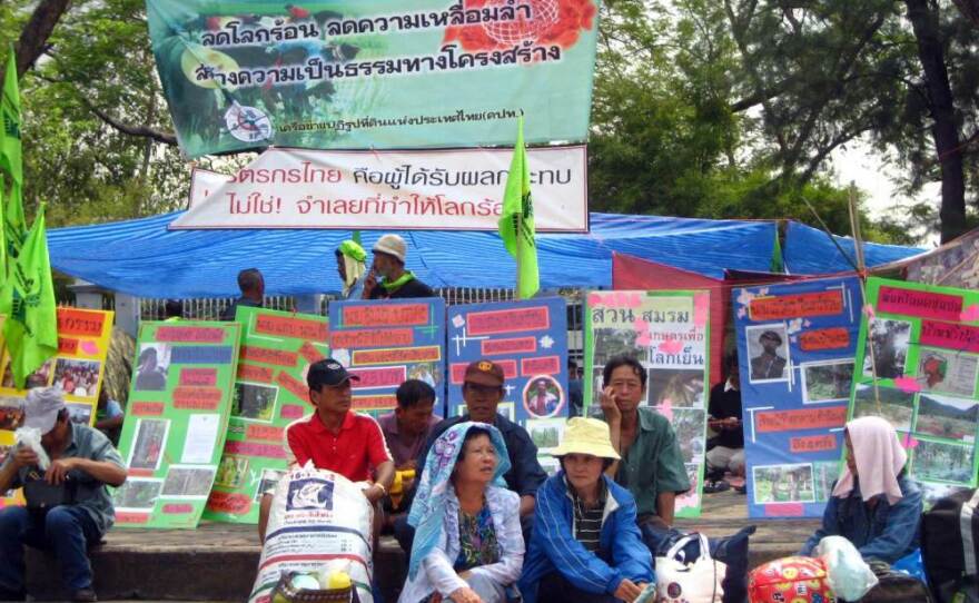 Urban and rural poor from Thailand protest outside government offices in Bangkok. Activists working for slum dwellers have made it harder for developers to obtain land in Thailand without first agreeing with residents on compensation.