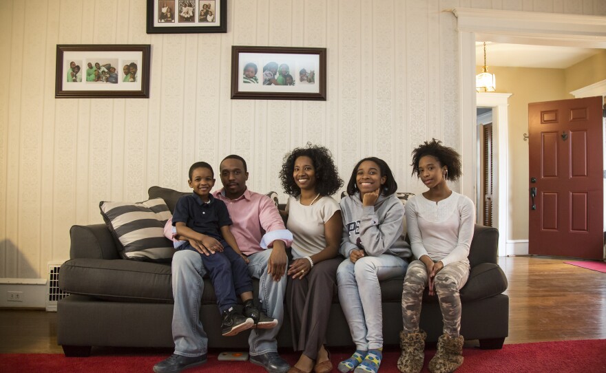 The Miller family sits in the living room of their home in a Philadelphia suburb. They are part of an ongoing lawsuit, arguing Pennsylvania has neglected its constitutional responsibility to provide all children a "thorough and efficient" education.