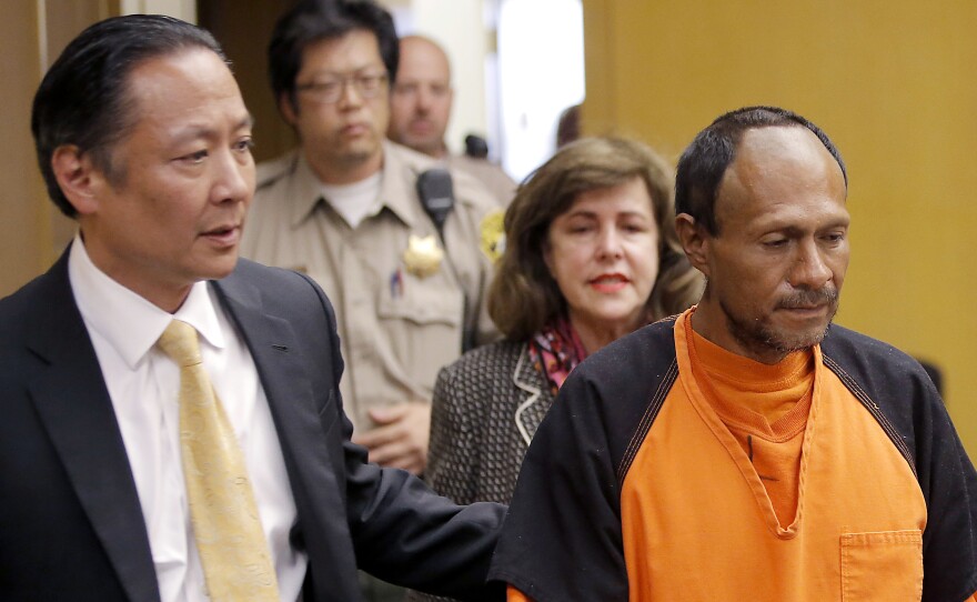 Jose Ines Garcia Zarate is led into the courtroom by San Francisco Public Defender Jeff Adachi in July 2015.