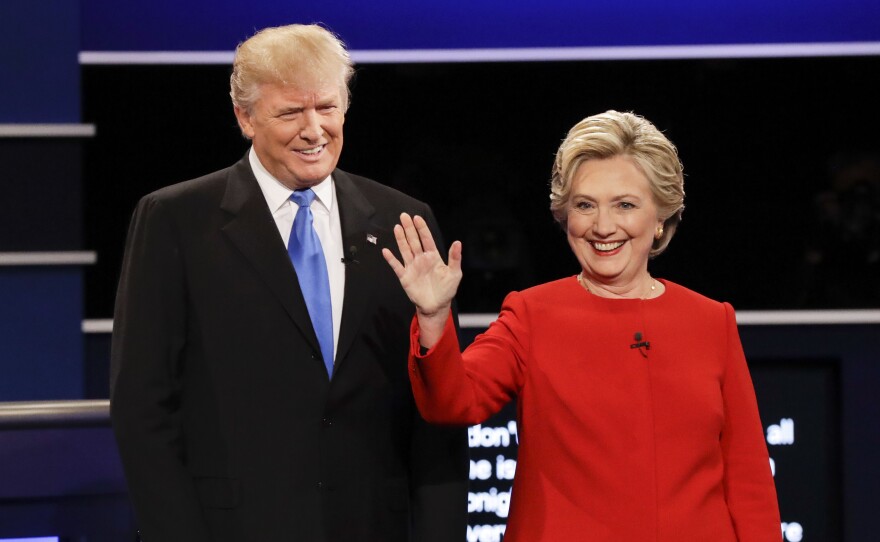 Republican presidential nominee Donald Trump and Democratic presidential nominee Hillary Clinton are introduced at the start of Monday night's presidential debate at Hofstra University in Hempstead, N.Y.