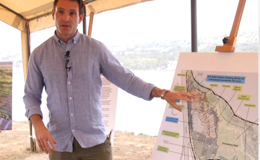 Caruso Vice President Bryce Ross, with a map of the proposed Agua Hedionda 85/15 Project. July 2015