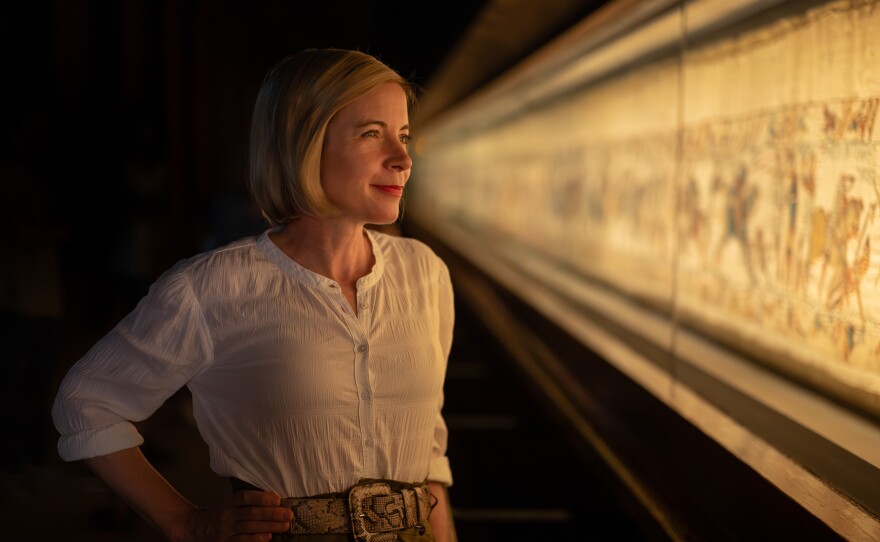 Lucy Worsley examines the Bayeux Tapestry, a 70-meter-long visual record of the Battle of Hastings. Musee de la Tapisserie de Bayeux, Caen, France.
