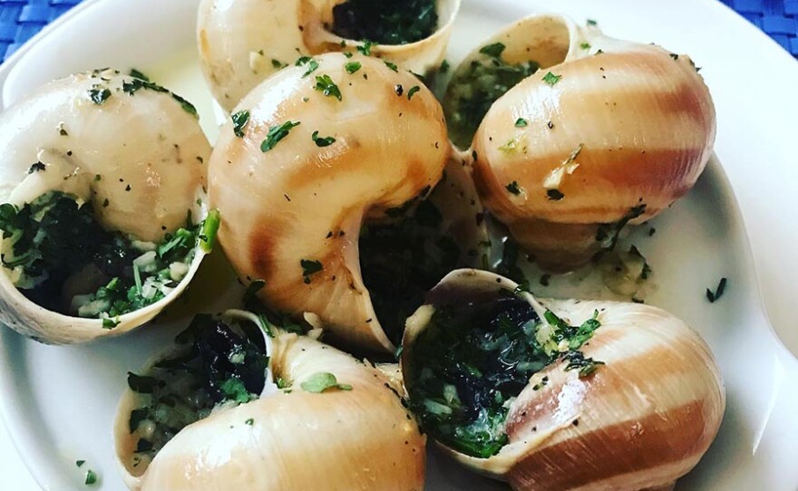 We get to taste the snails at the Crepe Cake restaurant in Tijuana, Mexico