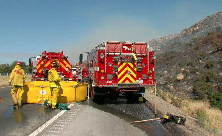 Cal Fire crews work to extinguish the Jennings Fire, July 11, 2017.