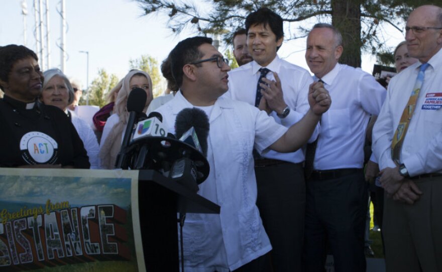 City Council Member Eric Guerra energizes the crowd at a unity rally joined by faith-based leaders, California Senate Pro Tempore Kevin de Léon and Mayor Darrell Steinberg in Sacramento, Tuesday March 28.