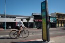 A cyclist rides past a bike counter on 30th Street in North Park, Jan. 30, 2026.