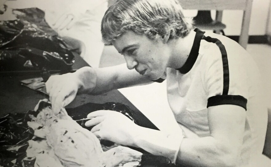 According to the yearbook: "Randy Paul dissects a cat, a required lab for anatomy students."