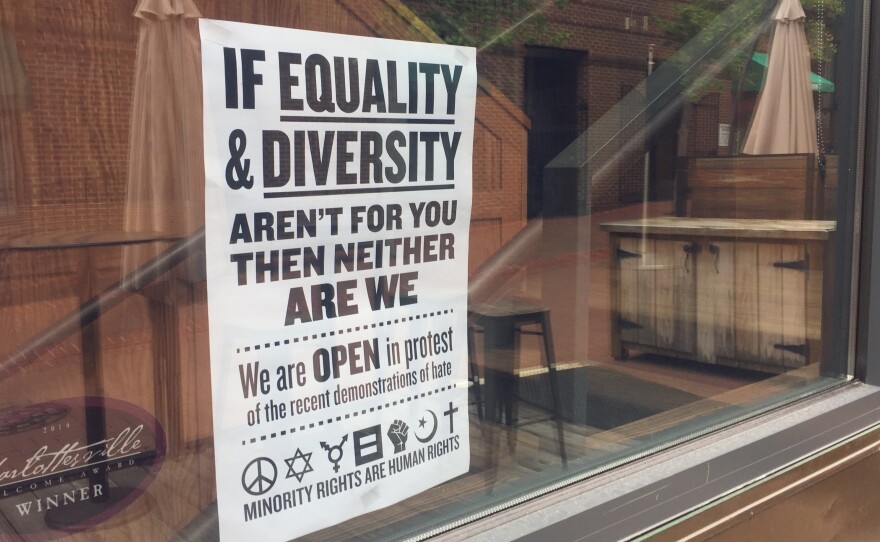 Several downtown stores have put up signs and placards declaring: "This is Our Town" and "If Equality and Diversity Aren't for You, Then Neither Are We."